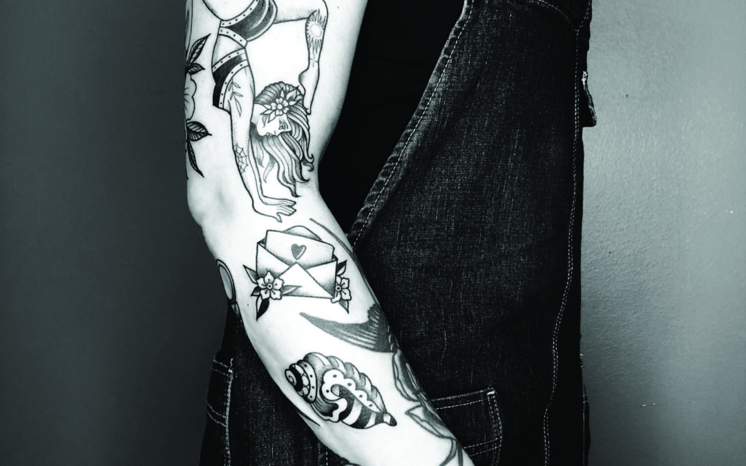 Veenom sleeve patchwork tattoo