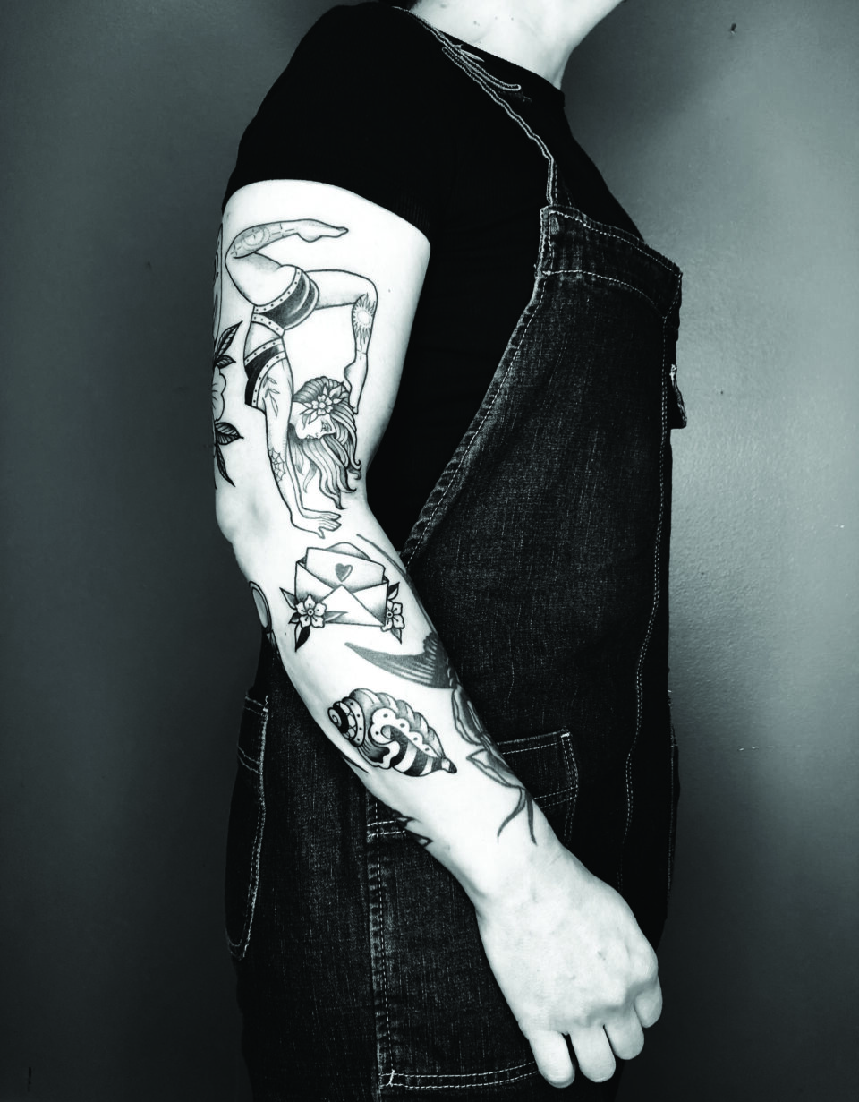 Veenom sleeve patchwork tattoo