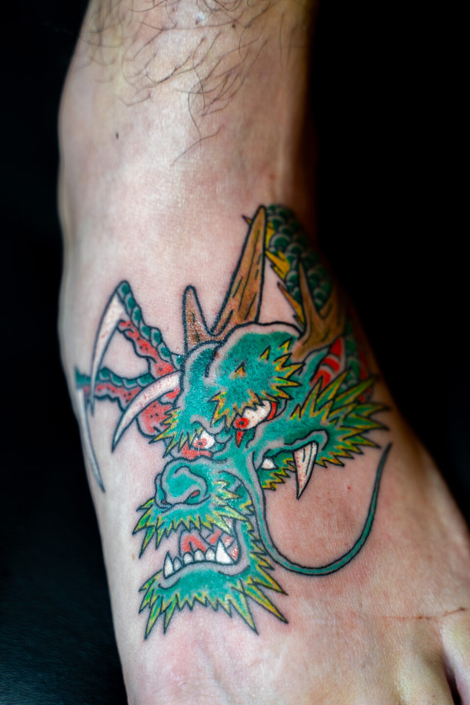 tattoo dragon pied ondori